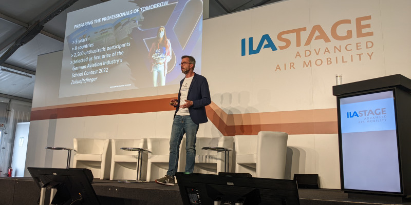 Frank Wernecke speaks at the Advanced Air Mobility Stage at ILA